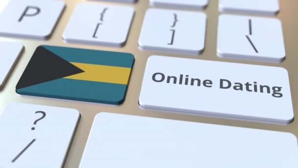 Текст онлайн датування і прапор Багамських островів на клавішних. Концептуальна 3D-анімація — стокове відео