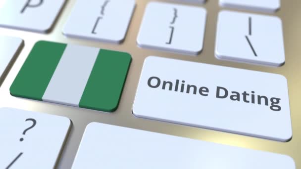 Online Dejting text och flagga Nigeria på tangentbordet. Konceptuell 3D-animering — Stockvideo
