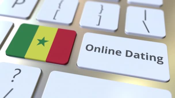 Online Dejting text och flagga Senegal på tangentbordet. Konceptuell 3D-animering — Stockvideo