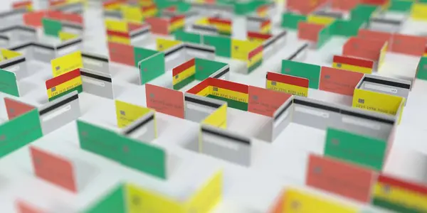 Bandera de Bolivia en el laberinto de tarjetas de crédito maqueta. Dificultades financieras relacionadas con la representación 3D — Foto de Stock