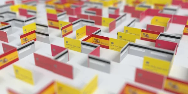 Labyrinthe de cartes de crédit fictives avec drapeau de l'Espagne. Difficultés financières liées au rendu 3D — Photo