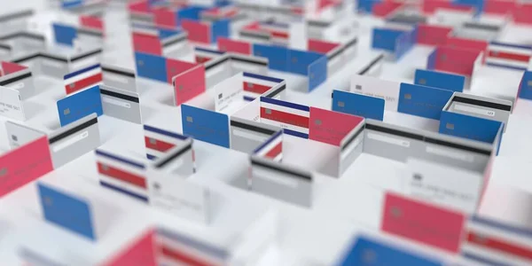 Bandera Nacional de Costa Rica en el laberinto de tarjetas de crédito maqueta. Dificultades financieras relacionadas con la representación 3D — Foto de Stock
