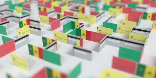 Bandera de Senegal en el laberinto de tarjetas de crédito maqueta. Problemas financieros relacionados con la representación 3D — Foto de Stock