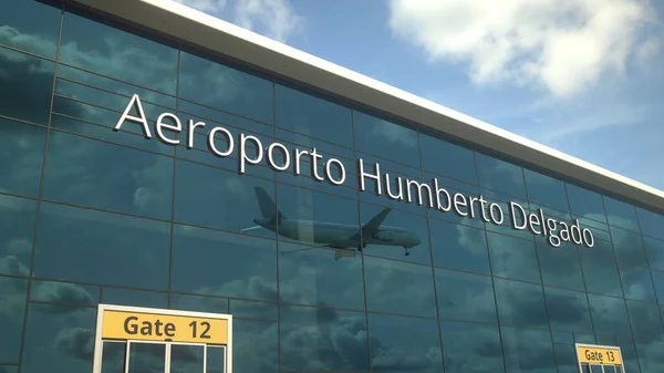 Atterrissage de l'avion de ligne réfléchissant dans les fenêtres avec Aeroporto Humberto Delgado ou Humberto Delgado texte de l'aéroport. Rendu 3d — Photo