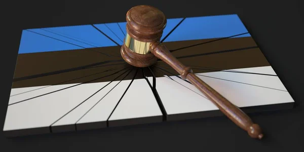 Block with flag of Estonia hit by judges gavel. Court related 3d rendering — Stock Photo, Image