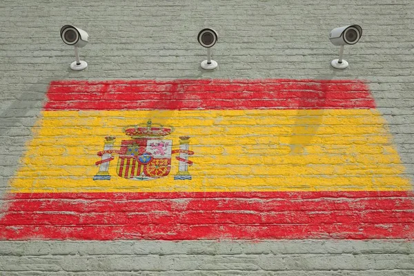 Cámaras de vigilancia y pared con bandera impresa de España. Concepto del sistema de seguridad nacional. Renderizado 3D — Foto de Stock