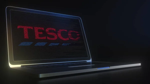 Logotipo TESCO feito com código de computador na tela do laptop. Editorial conceitual 3d renderização — Fotografia de Stock