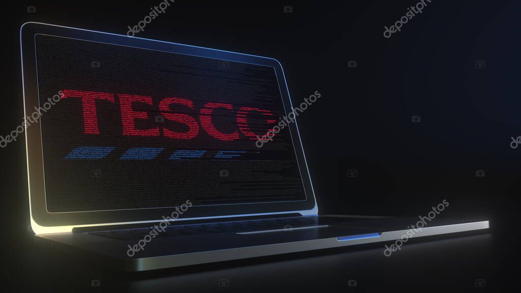Computer screen with the logo made with source code