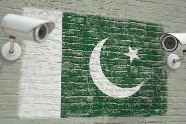 Wall with national flag of Pakistan and CCTV cameras. Privacy or surveillance system related conceptual 3D rendering — Stock Photo, Image