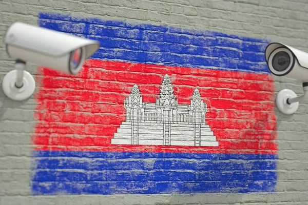 Muur met nationale vlag van Cambodja en CCTV camera 's. Privacy of surveillance systeem gerelateerde conceptuele 3D rendering — Stockfoto