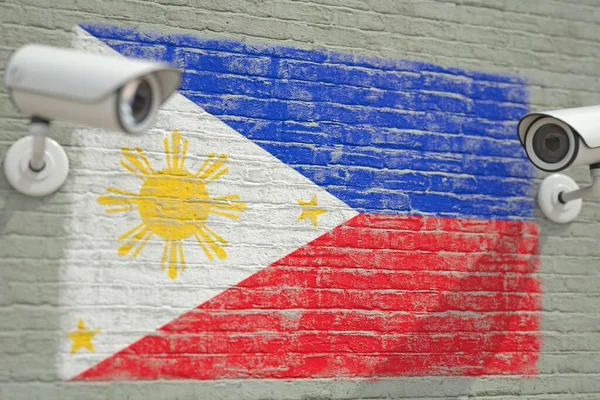 Câmeras de vigilância e parede com bandeira de Filipinas. Renderização 3D relacionada à segurança moderna — Fotografia de Stock