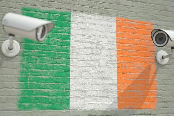 監視カメラとアイルランドの旗と壁。現代のセキュリティ関連の3Dレンダリング — ストック写真