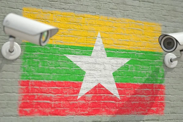 CCTV-Kameras und Wand mit der Flagge Myanmars. Überwachungsbezogenes 3D-Rendering — Stockfoto