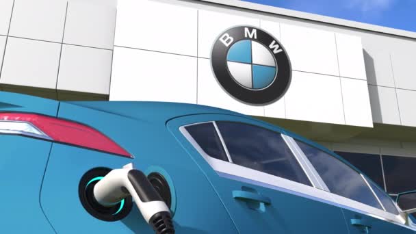 BMW logo and the electric car plug. Editorial conceptual 3d animation — Stock Video