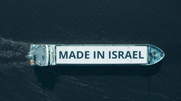 Ovanifrån vy av ett lastfartyg med MADE IN ISRAEL text — Stockfoto