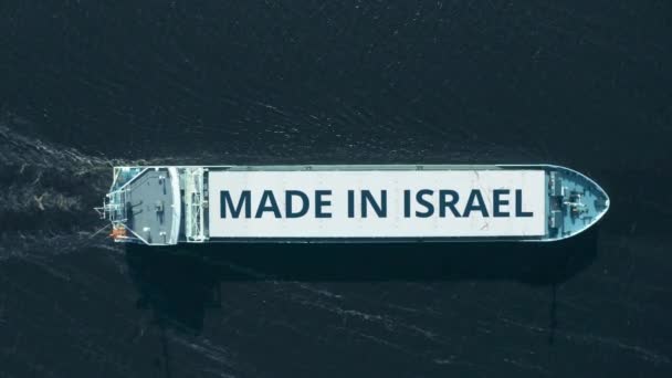 Ovanifrån vy av ett lastfartyg med MADE IN ISRAEL text — Stockvideo