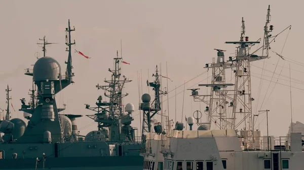 Many naval ships with flags at Russian military base — Stock Photo, Image