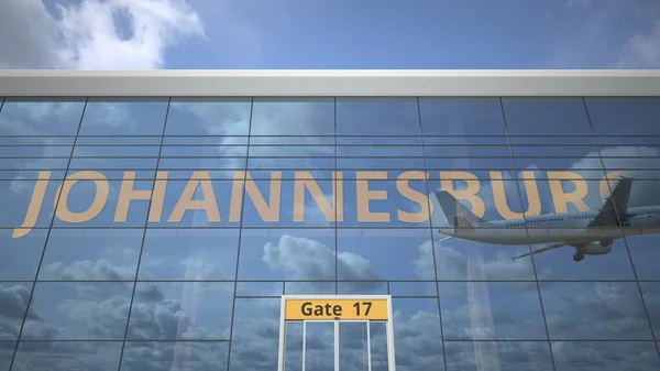 Passagierflugzeug reflektiert in den Fenstern des Flughafenterminals mit JOHANNESBURG-Text. 3D-Darstellung — Stockfoto