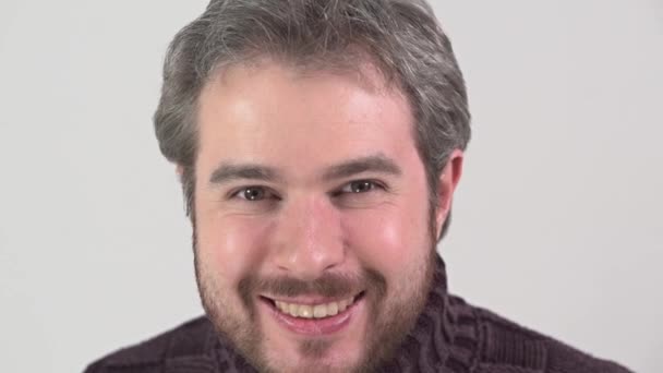 Portrait of bearded smiling man in sweater — Stock Video