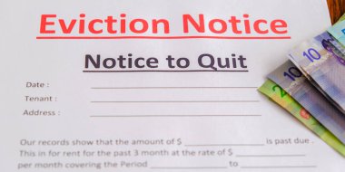Eviction notice with Cash Canadian Dollars to pay outstanding clipart