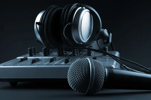 Microphone with mixer and headphones — Stock Photo, Image