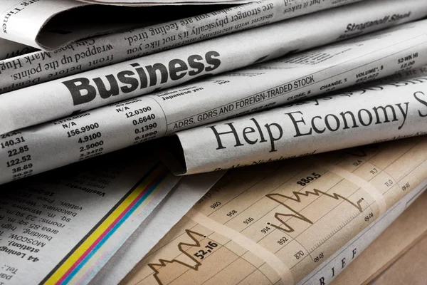 Business newspapers — Stock Photo, Image