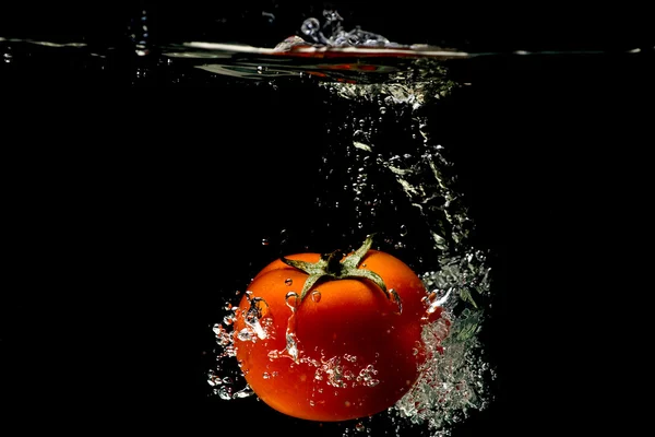 Tomato water splash — Stock Photo, Image