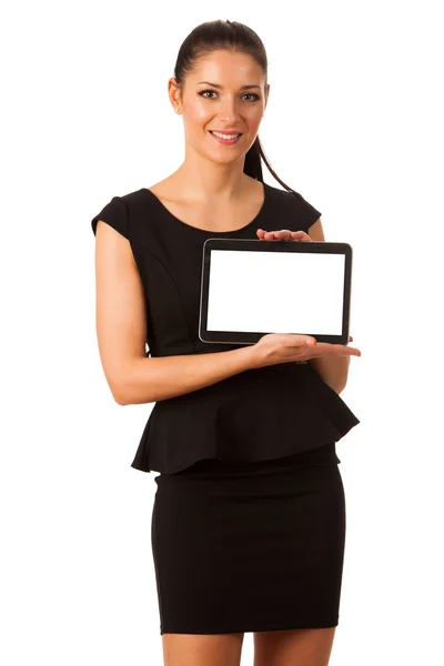 Geschäftsfrau hält Tablet-Computer in der Hand und zeigt leeren Monitor — Stockfoto