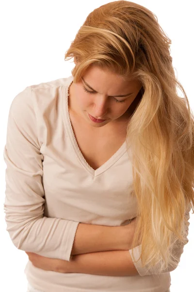生病的妇人与进食或孤立的白色的腹部疼痛 — 图库照片