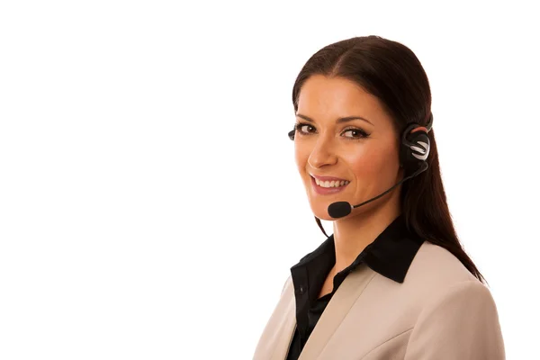 Mujer con auriculares y micrófono trabajando en call center para hel — Foto de Stock