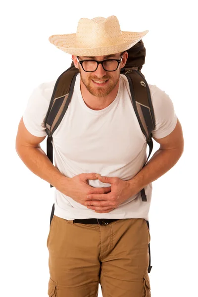 Traveler having stomach ache, nausea wearing straw hat, white sh — Stock Photo, Image