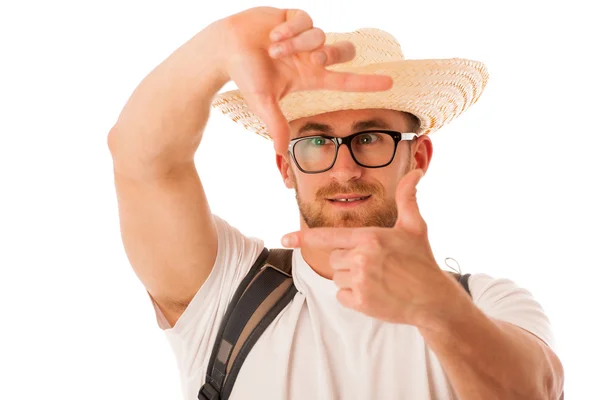 Closeup of confident happy traveler with straw hat framing photo — Stock Photo, Image