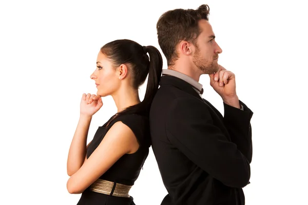 Confident business couple leaning on each other with backs, hold — Stock Photo, Image