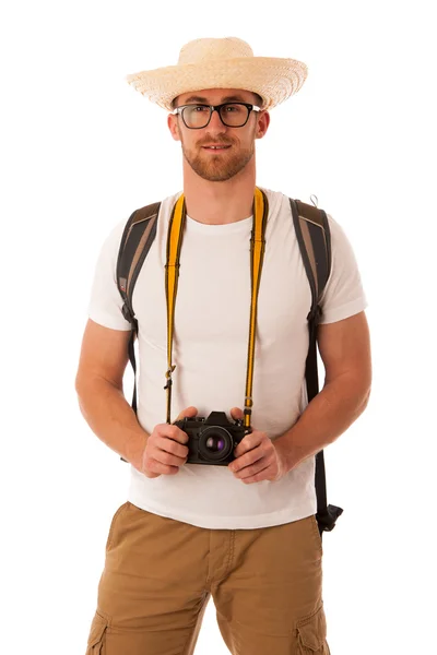 Viajante com chapéu de palha, camisa branca, mochila e câmera fotográfica — Fotografia de Stock