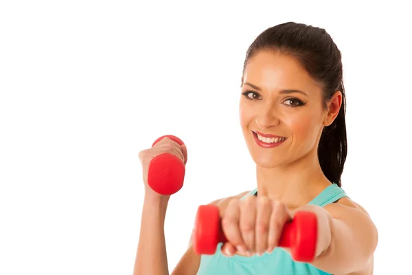 Mujer activa con pesas entrenamiento en gimnasio de fitness aislado sobre — Foto de Stock