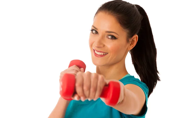 Mujer activa con pesas entrenamiento en gimnasio de fitness aislado sobre —  Fotos de Stock