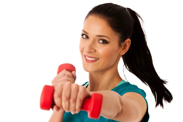 Mujer activa con pesas entrenamiento en gimnasio de fitness aislado sobre —  Fotos de Stock