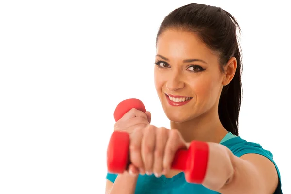 Mujer activa con pesas entrenamiento en gimnasio de fitness aislado sobre —  Fotos de Stock