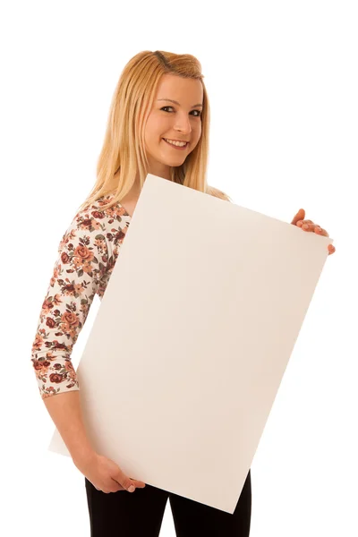 Cute blond woman with blank white banner isolated over white bac — Stock Photo, Image