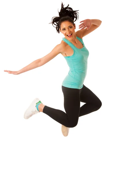 Happy fit and slim woman dancing and jumping isolated over white — Stock Photo, Image