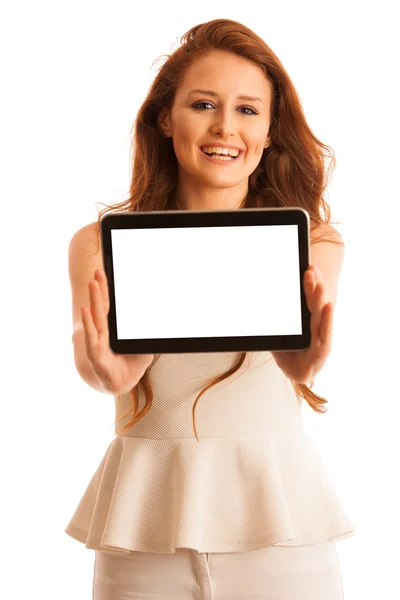 Business woman brousing the web on a tablet isolated over white — Stock Photo, Image