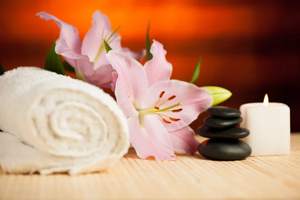 Spa concept of lily flower, towels, sea salt, candle and crystal — Stock Photo, Image