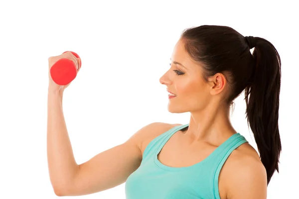 Mujer activa con pesas entrenamiento en gimnasio de fitness aislado sobre —  Fotos de Stock