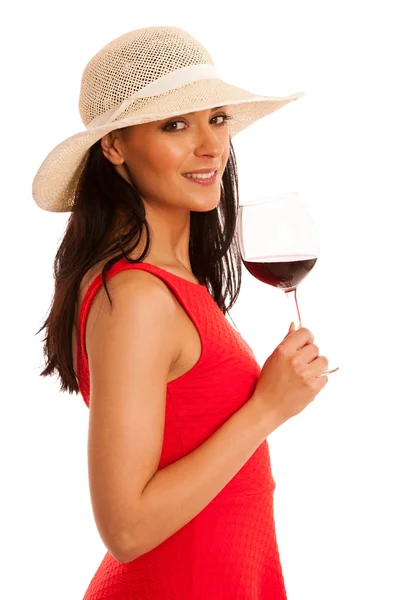 Frau im roten Sommerkleid mit Glas Wein — Stockfoto