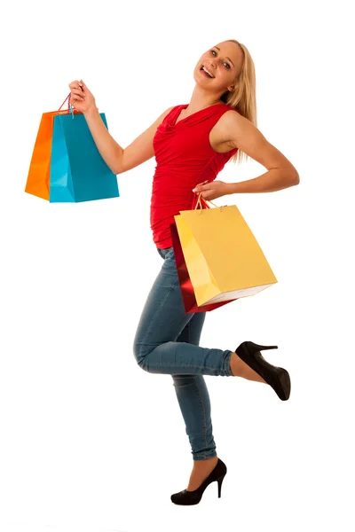 Hermosa joven con bolsas de compras consumismo aislado ov — Foto de Stock