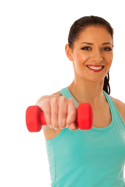 Mujer activa con pesas entrenamiento en gimnasio de fitness aislado sobre —  Fotos de Stock