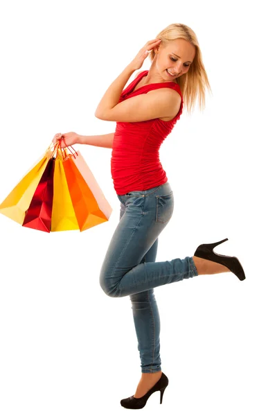 Mooie jonge vrouw met boodschappentassen consumentisme geïsoleerd ov — Stockfoto