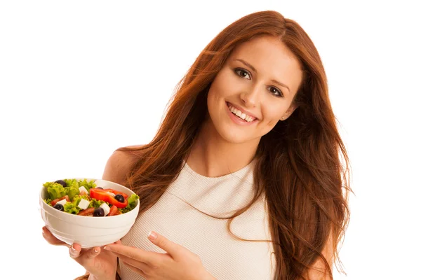 Alimentación saludable - mujer come un tazón de ensalada griega aislado sobre — Foto de Stock