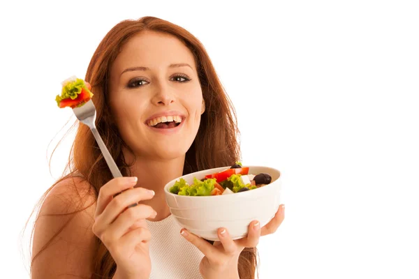 Alimentación saludable - mujer come un tazón de ensalada griega aislado sobre — Foto de Stock