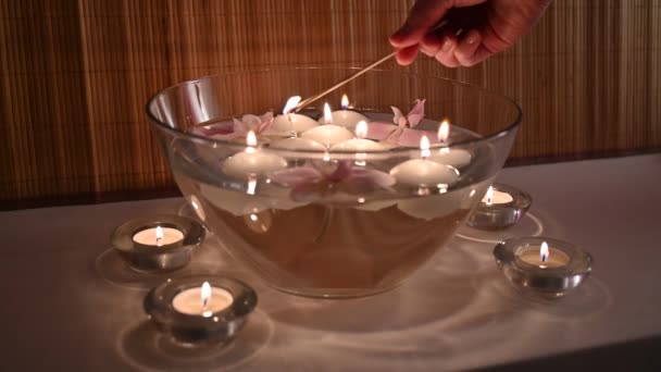 Candle Lights Burning Ina Bowl Water Spa Salon — Stock Video